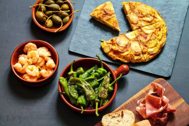 Authentic Spanish tapas garlic prawns and traditional tortilla