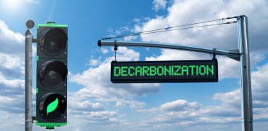 Traffic light with leaf symbol and road information board with text DECARBONIZATION on a background of blue sky. Carbon neutrality concept clipart
