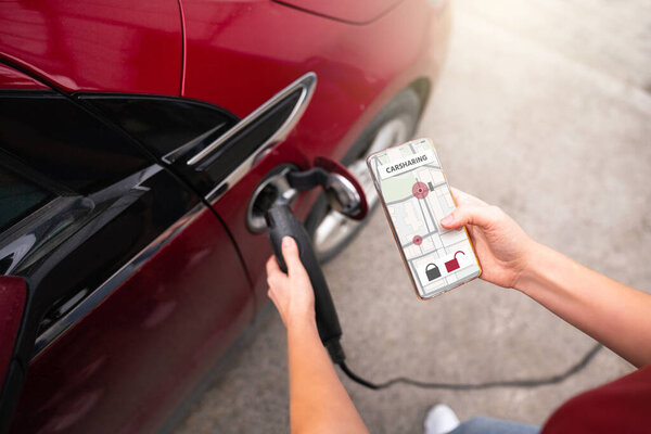 Hands Mobile Phone Charging Plug Background Carsharing Electric Car — Stock Photo, Image