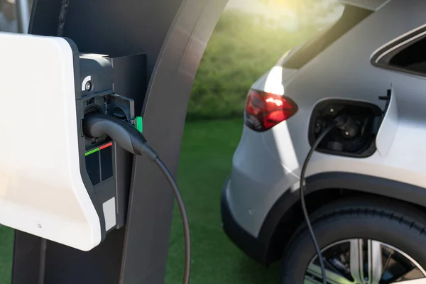 Electric car with a charger — Stock Photo, Image