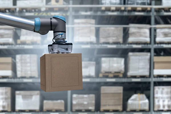 Robot arm moves boxes in an automatic warehouse. Concept