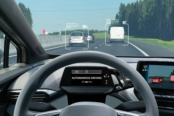 Autonomous car on a road. Inside view.