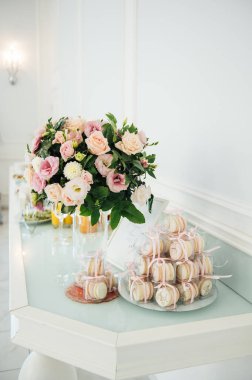 Delicious pink macaroons for guests. wedding ceremony