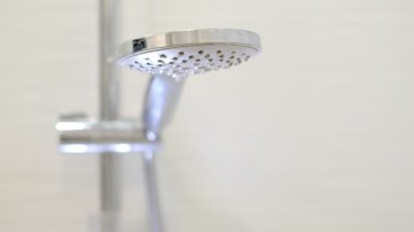 water flow in front of camera, falling drops in slow motion. Close-up shooting stock footage