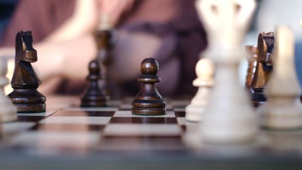 Unrecognizable woman playing chess. strategy, management or leadership concept. slow motion video. — Stock Video