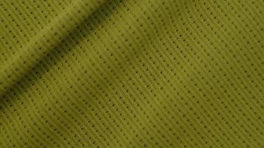 Bir çanta ya da giysi için köpükle kaplanmış ağ. Yeşil özel tekstil ağı arka planı. Sırt çantaları üretimi için köpük kauçukla polyester örgü..