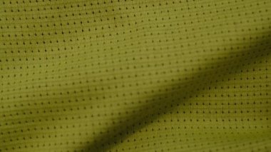 Polyester kumaşlar makro dokular. Yeşil polyester. Bir çanta ya da giysi için köpükle kaplanmış ağ. yeşil özel tekstil ağ arkaplanı.