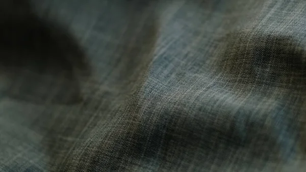 Зелений лляний текстильний абстрактний фон. Концепція швейної промисловості. Хвильовий матеріал. велюрові тканинні нитки макро . — стокове фото