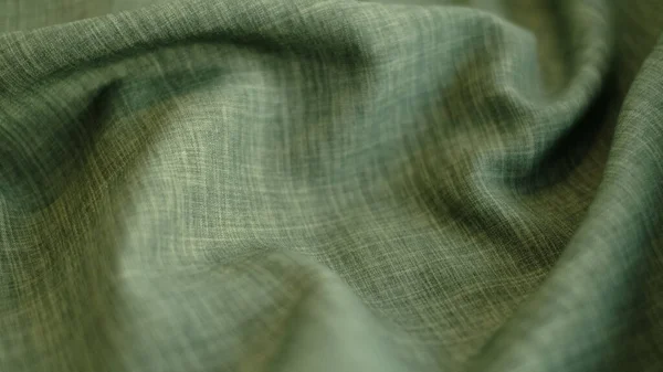 Fondo abstracto textil de lino verde. Concepto de industria de la ropa. Material ondulado. hilos de tela de terciopelo macro. — Foto de Stock