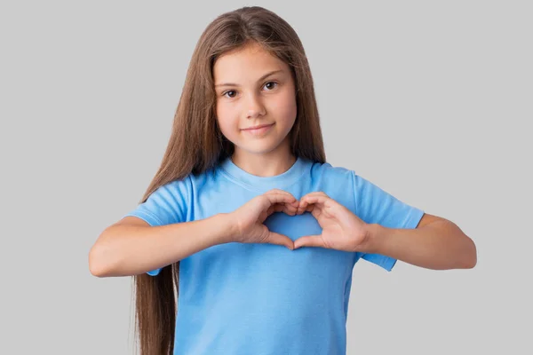 Adorable Niña Pequeña Camiseta Azul Haciendo Gesto Corazón Con Sus —  Fotos de Stock