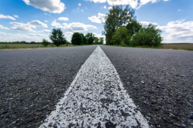 New smooth asphalt road in summer