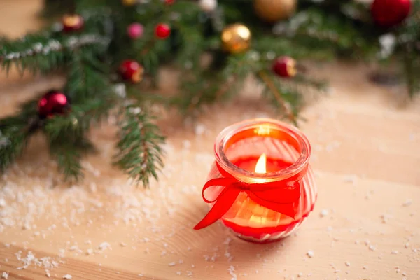 Red Candle Wooden Table Fir Tree Decoration Background Festive Mood — Stockfoto