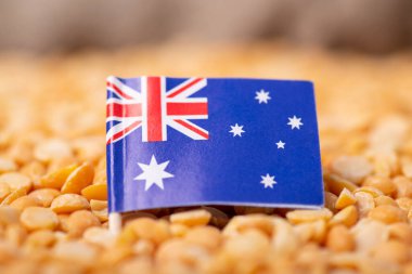 Flag of Australia on dried yellow peas. Origin of pea production, harvest in Australia
