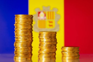 Economic problems in Andorra country. Negative graph made of golden coins in front of Andorra flag