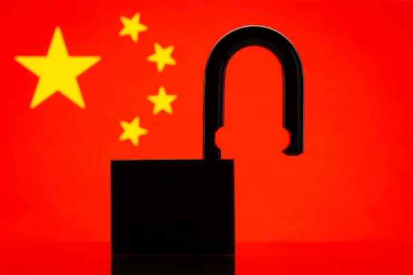 Silhouette of open lock on the background of flag of China. Reopen country, hospitality, travel concept