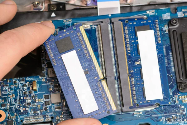 Changing RAM chip on a laptop. Upgrading laptop by adding fast DDR memory module
