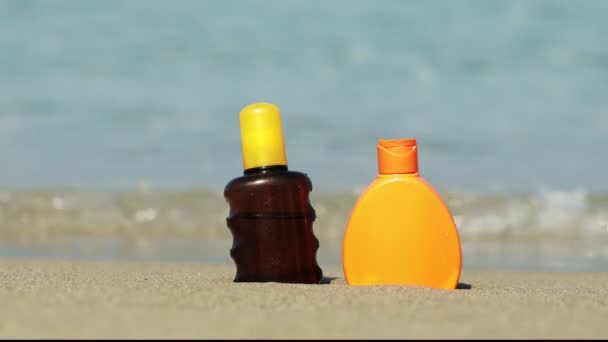 Closeup Sunscreen Protection Set Sandy Beach Tropical Seaside Warm Sunny — Stock Video