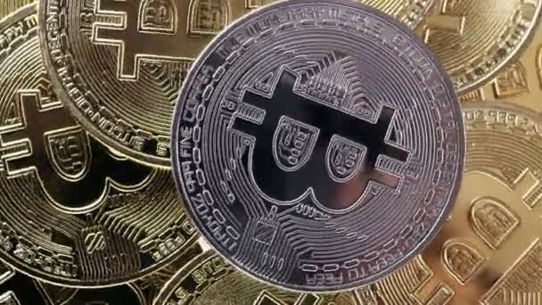 கிரிப்டோ நாணயம், பிட்காயின். BTC, பிட் நாணயம். Blockchain தொழில்நுட்பம், பிட்காயின் சுரங்க. சுழலும் பிட்காயின்களின் மேக்ரோ ஷாட் — ஸ்டாக் வீடியோ