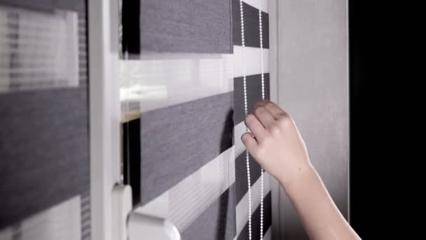 Woman Hands Closing Rolling Shutter Roller Blind Sunny Day Window — Stock Video