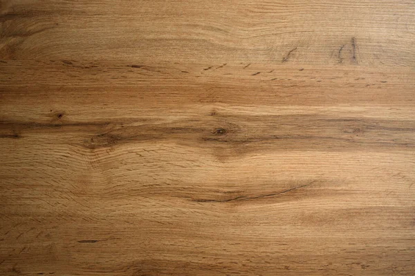Ahşap arka plan dokusu. Eskimiş düğümlü tahtanın açık kahverengi yüzeyi doğal renkte..