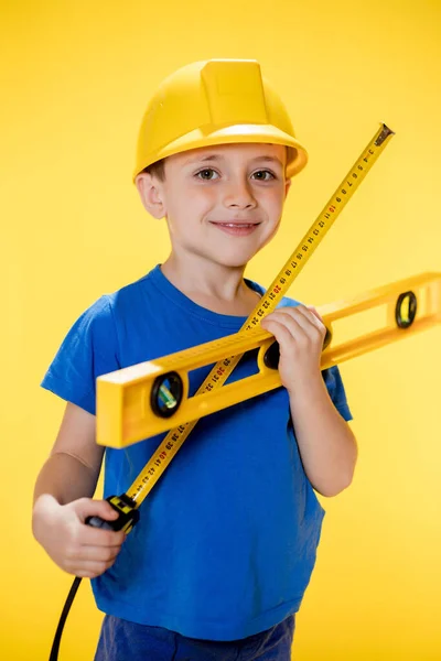 Preschooler Holds Construction Level His Hands Dreams Becoming Builder — Fotografia de Stock