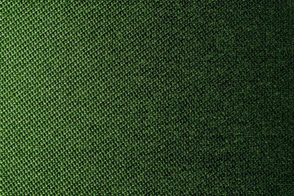 Hasır desenli tekstil malzemesinin koyu yeşil arka planı, yakın çekim. Zeytin dokusunun yapısı. Kumaş arkaplanı.