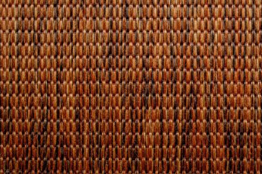 Hasır arka plan doğal samandan yapılmış. Yoğun biçimde dokunmuş saman desenli. Doğal, doğal arkaplan.