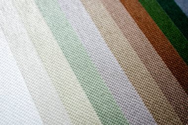 Renkli kumaş arka plan. Yoğun kumaşın renk çeşitliliği. Renk paleti.