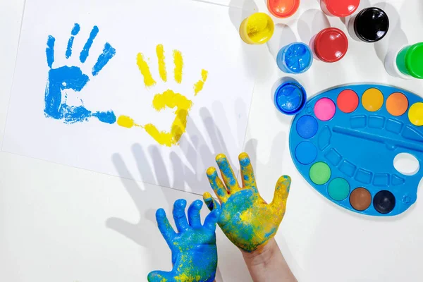 Children Handprints Blue Yellow Palm Prints White Sheet Paper Children — Photo