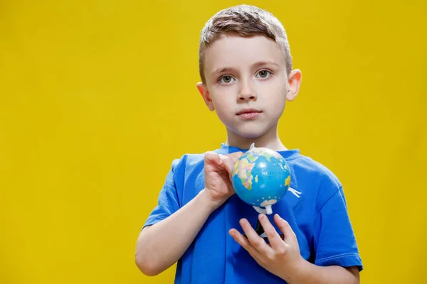 Preschooler Discovers World Cute Boy Holds Small Globe His Hands — Stock Photo, Image