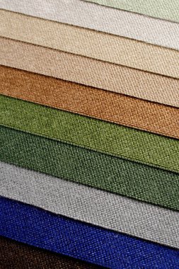 Farklı kumaş renkleri kataloğu. Yoğun kumaşın renk çeşitliliği. Renk paleti.