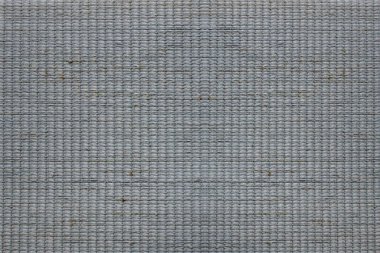 Gri panjurlar için güneş kremi. Arkaplan için gri kumaş dokusu.