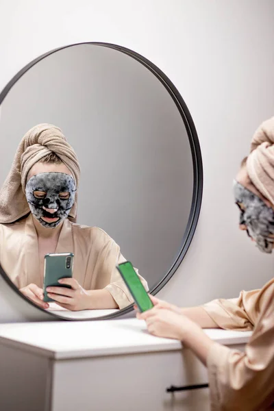 Woman Front Mirror Applies Moisturizing Mask Care Facial Skin Looks — Stock Photo, Image