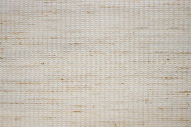 Yoğun desenli kumaşın bej arka planı. Kumaş jaluzi, paspas, duvar kağıdı üretimi için kumaş.