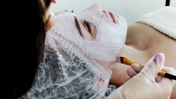 Beautician Applies Mask Skin Woman Face Therapeutic Purposes Rejuvenation Acne — Video Stock