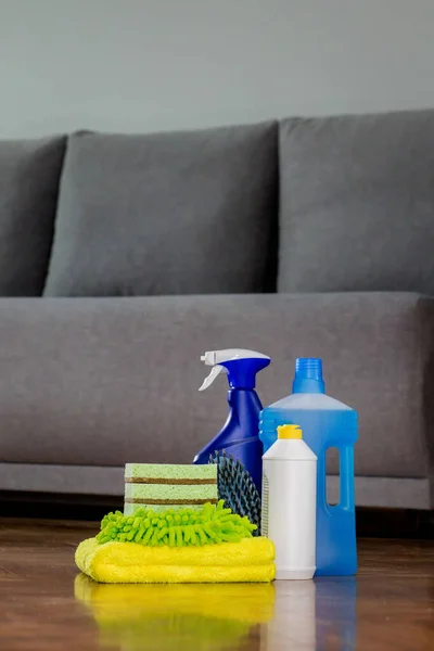 Containers with liquids for cleaning the house and various rags, washcloths. Housework. House order.