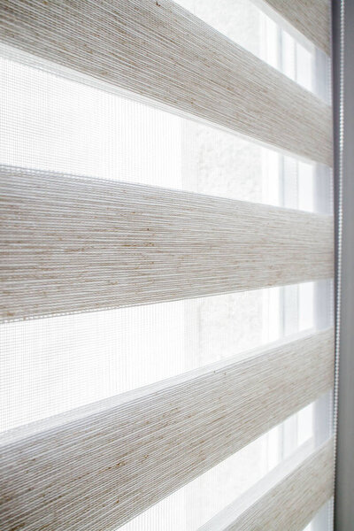 Window roller duo system day and night. Close up on roll curtains indoor