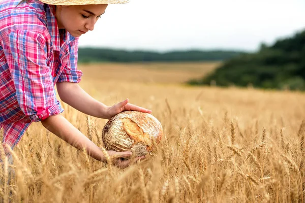 Woman Farmer Holds Organic Grain Bread Her Hands Background Wheat — Zdjęcie stockowe