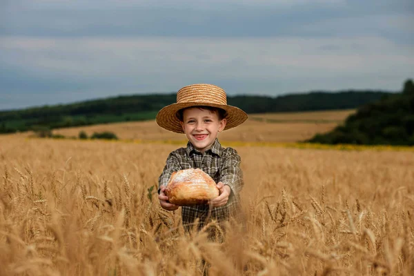 Little Boy Straw Hat Shirt Held Out His Handing Bread — Foto de Stock
