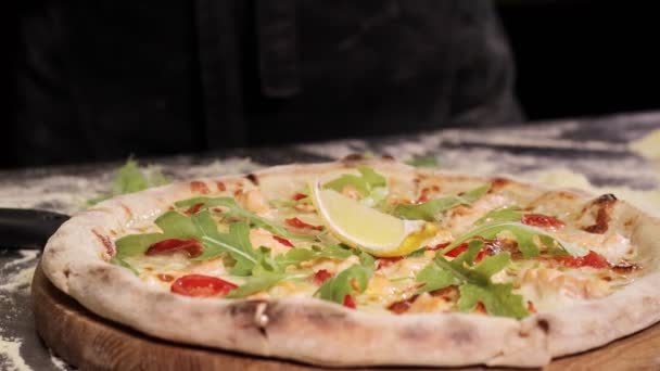 Chef Decorates Freshly Baked Pizza Lamon Sprinkles Cheese Cream Based — Stock Video