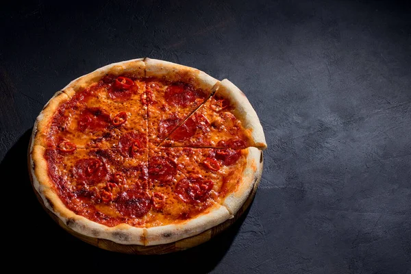 Pizza Tomato Sauce Mozzarella Salami Chili Honey Black Background View — Foto de Stock