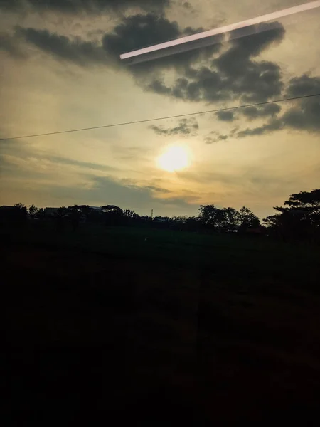The beautiful appearance of the sun in the expanse of the sky at sunset