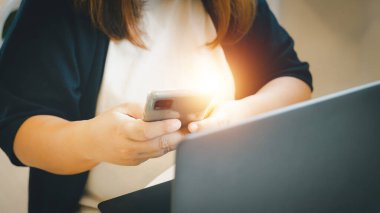 Online Selling or Online Shopping concept.Asian woman works at home by selling online and he is currently accepting and taking orders.business of seller merchant online ecommerce.