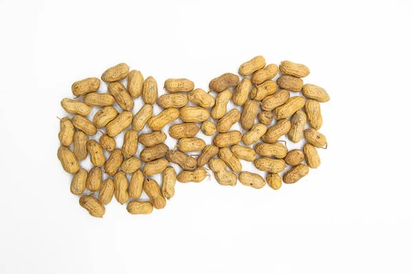 Trocken Ungeschälte Erdnüsse Nahaufnahme Isoliert Auf Weißem Hintergrund — Stockfoto