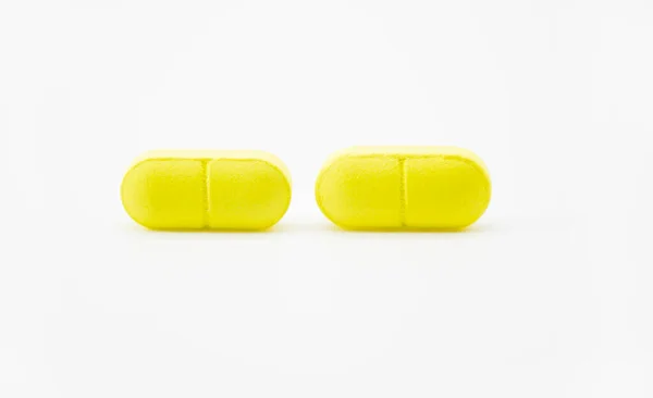 Pillole Gialle Isolate Sfondo Bianco — Foto Stock