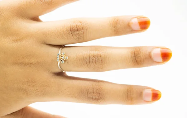 Close up of elegant diamond ring on white background. engagement ring