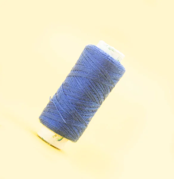 Blue Color Yarn Spool Thread Yellow Background — Stock Photo, Image