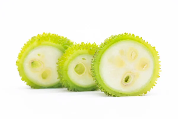 slices spiny gourd isolated on white background, kakrol