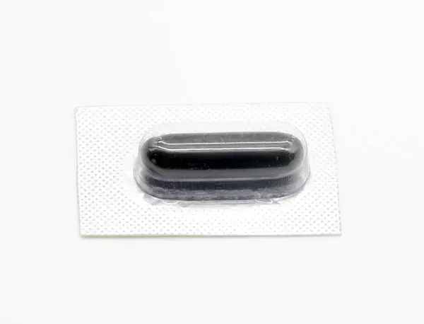 Black Pill Isolate White Background Vitamin Pill Side View — Stockfoto