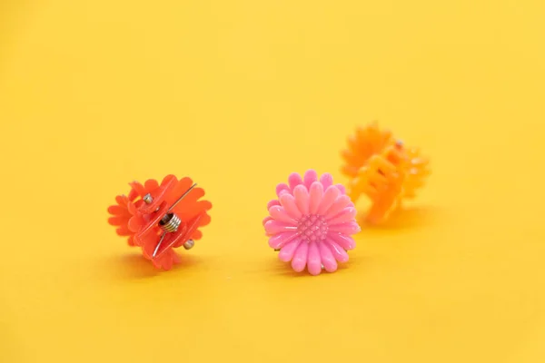 Cute kids hair claws on yellow background. Hair clips, hairpins. Fashion design hair accessories for little girls.